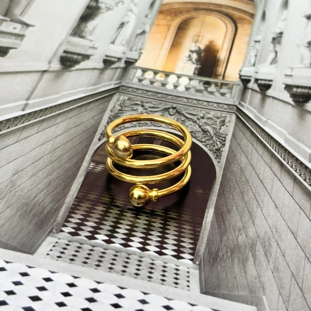 Spiral gold stainless steel ring
